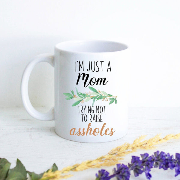 I'm Just a Mom Trying Not To Raise Assholes Greenery - White Ceramic Mug